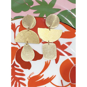 Style is Katia. Color is Gold. Handmade jewelry brass statement earrings. Hogan Parker is a contemporary luxury online shop for books, gifts, vintage wares, soap, jewelry, home decor, cookware, kitchenware, and more.