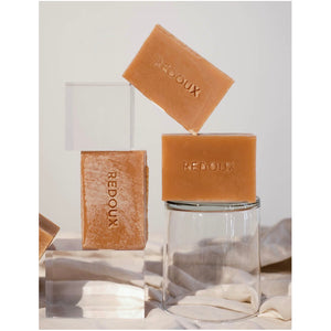 Bath and body. Handmade botanical bar soap in Tumeric. From Redoux. Hogan Parker is a new contemporary luxury online shop for books, thoughtful gifts, soap, jewelry, home decor, cookware, kitchenware, and more.