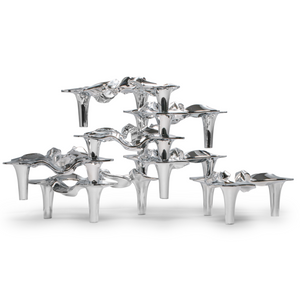 Steel organic hand-polished candle holder. Hogan Parker is a contemporary luxury online shop for books, gifts, vintage wares, soap, jewelry, home decor, cookware, kitchenware, and more.