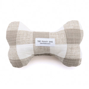 Luxury dog toys for the modern home from Hogan Parker. Eco-friendly dog bone dog toy in gingham taupe. The Foggy Dog.