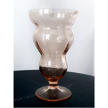 Load image into Gallery viewer, Vintage wavy glass goblet. Color is peachy blush. Shop drinkware. Hogan Parker is a contemporary luxury online shop for books, gifts, vintage wares, soap, jewelry, home decor, cookware, kitchenware, and more.
