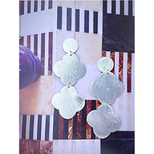 Load image into Gallery viewer, Style is Gloria Middie. Color is Silver. Handmade jewelry brass statement earrings. Hogan Parker is a contemporary luxury online shop for books, gifts, vintage wares, soap, jewelry, home decor, cookware, kitchenware, and more.
