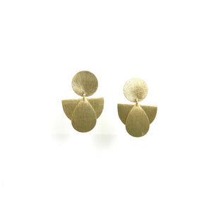 Style is Ina. Color is Silver. Handmade jewelry brass statement earrings. Hogan Parker is a contemporary luxury online shop for books, gifts, vintage wares, soap, jewelry, home decor, cookware, kitchenware, and more.