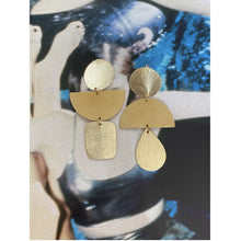 Load image into Gallery viewer, Style is Katia. Color is Gold. Handmade jewelry brass statement earrings. Hogan Parker is a contemporary luxury online shop for books, gifts, vintage wares, soap, jewelry, home decor, cookware, kitchenware, and more.
